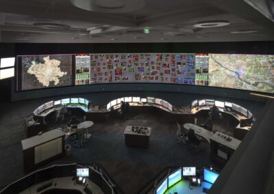Very large monitoring station with multiple monitoring stations and a very large video wall.