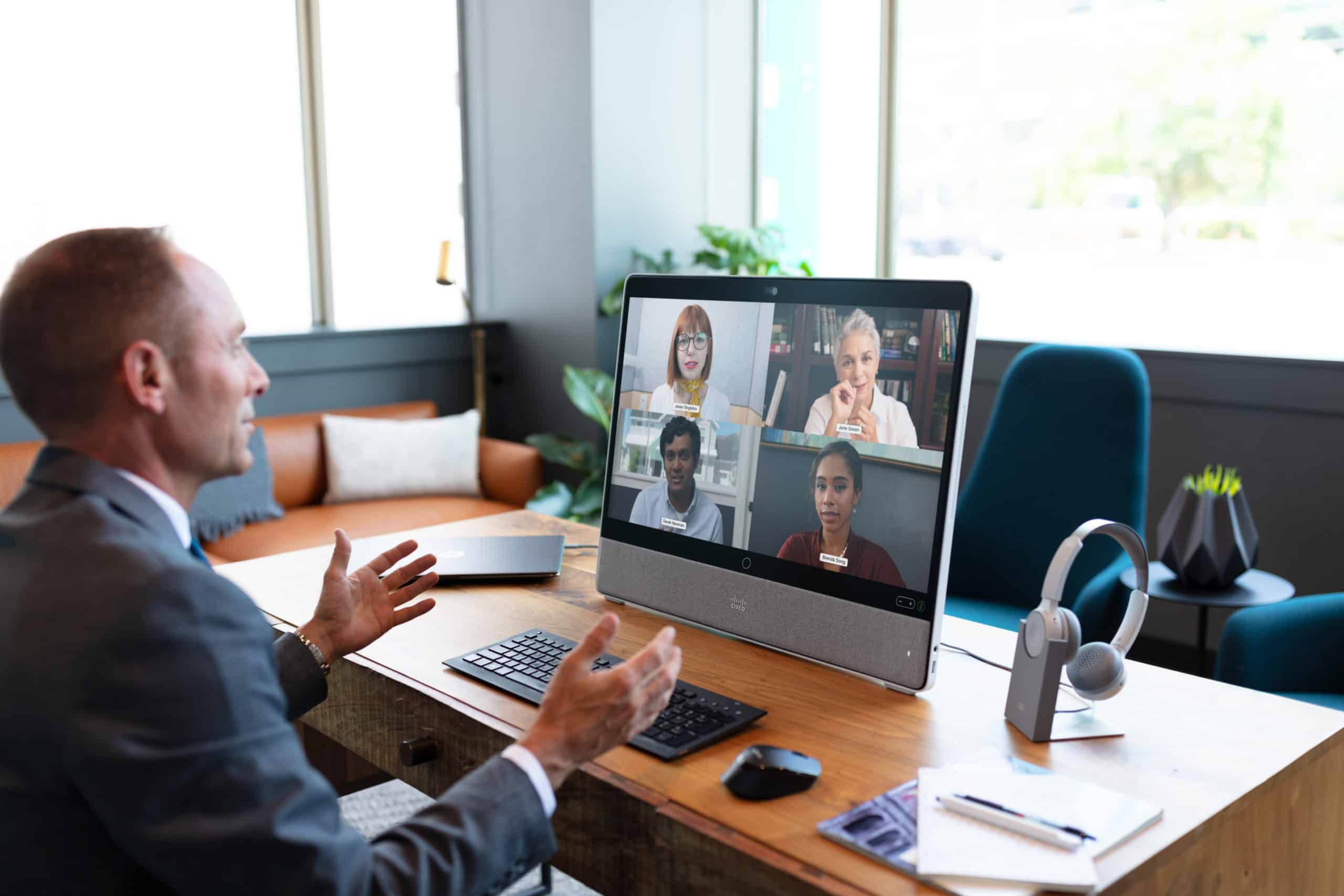 Executive participating in an virtual meeting