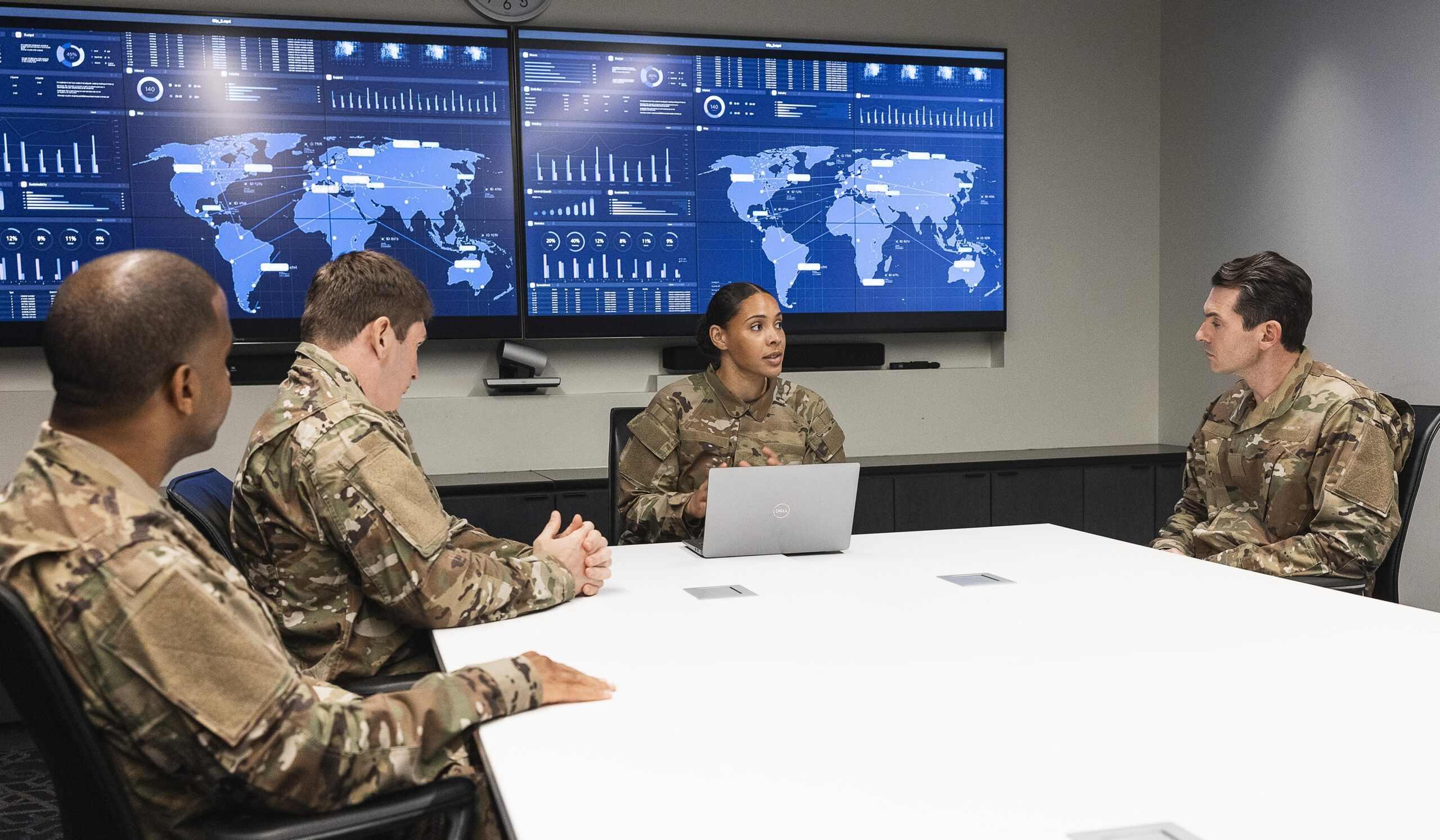 Federal government conference room with world maps on screen